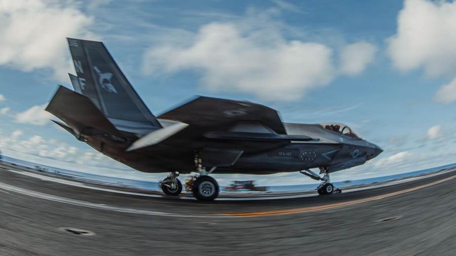 An F-35C Lightning II launching from the flight deck of USS George Washington in the Philippine Sea — the fifth-generation fighter the F/A-XX will fly alongside on future carrier decks