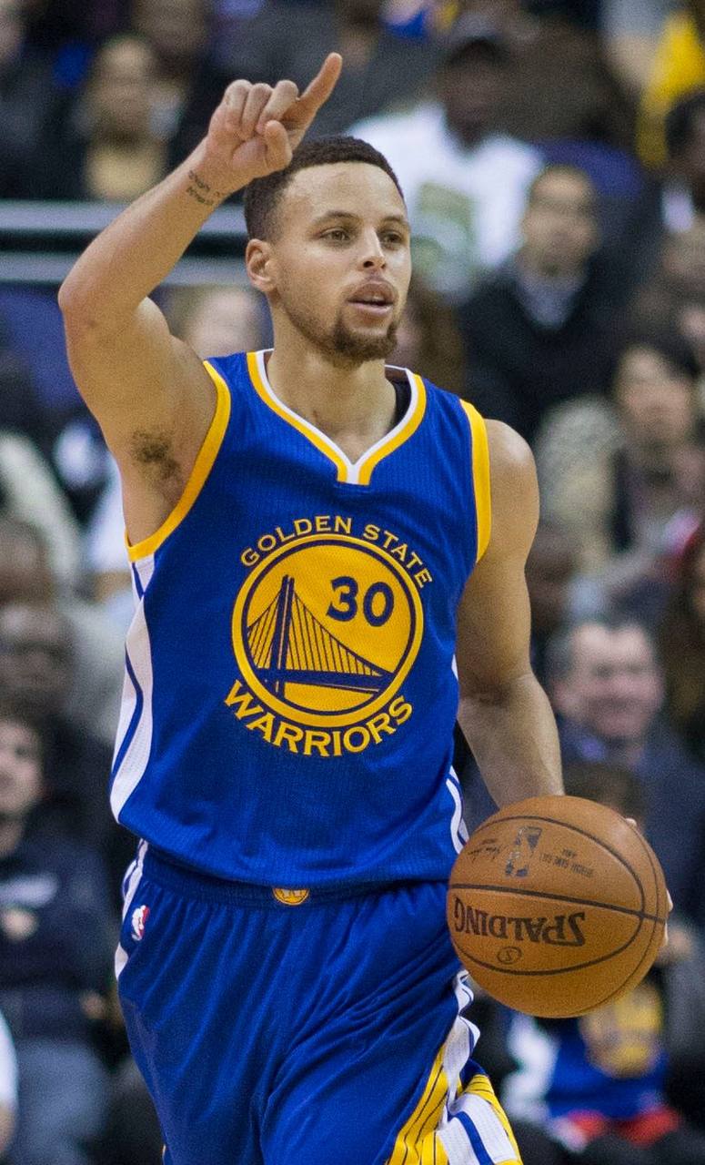 Stephen Curry dribbling for the Golden State Warriors