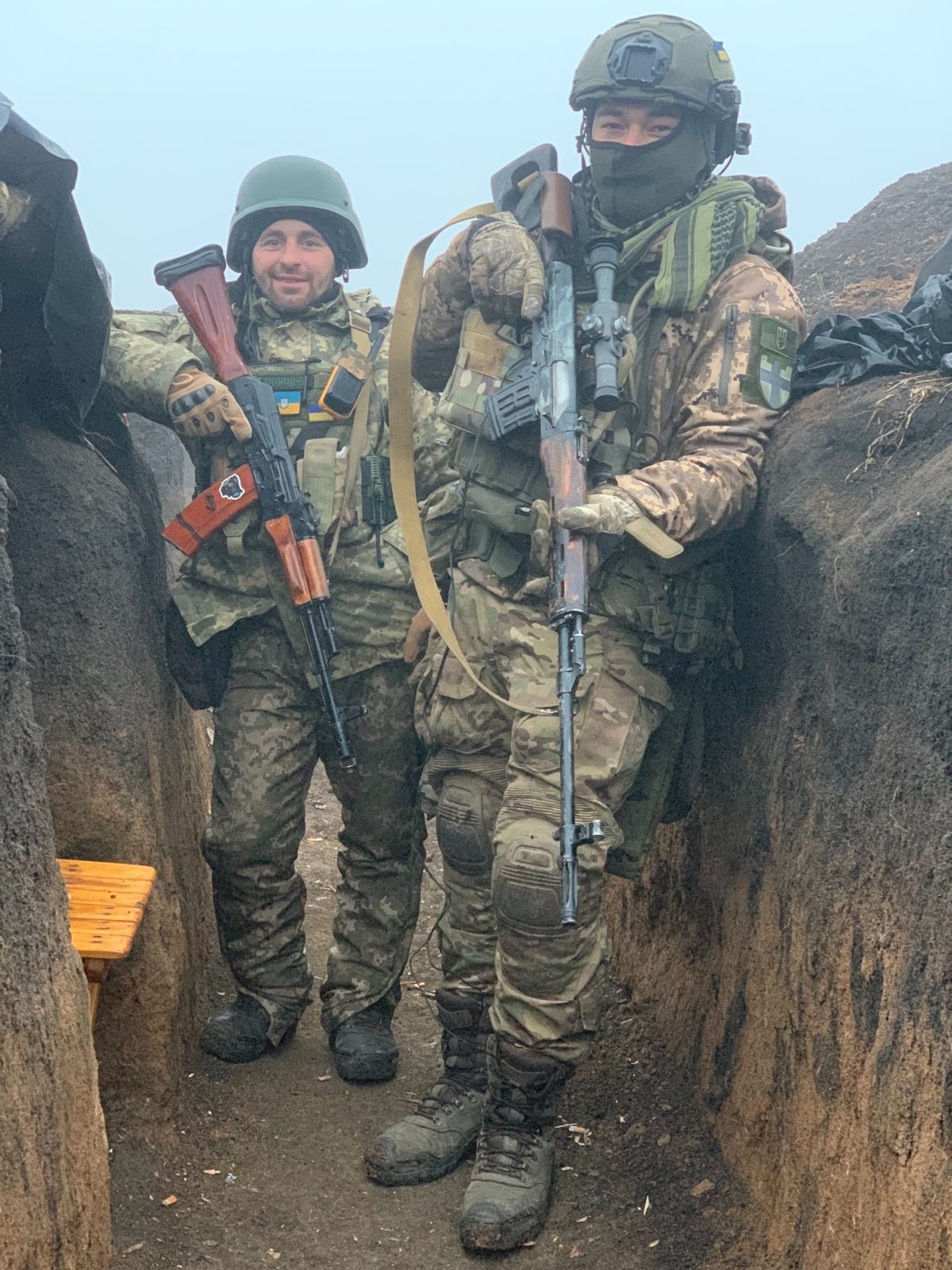 Two Ukrainian soldiers of the 100th Separate Mechanised Brigade standing in a front-line trench in Ukraine — a file photograph of the trench warfare on the front lines where foreign recruits fighting in Ukraine have been deployed