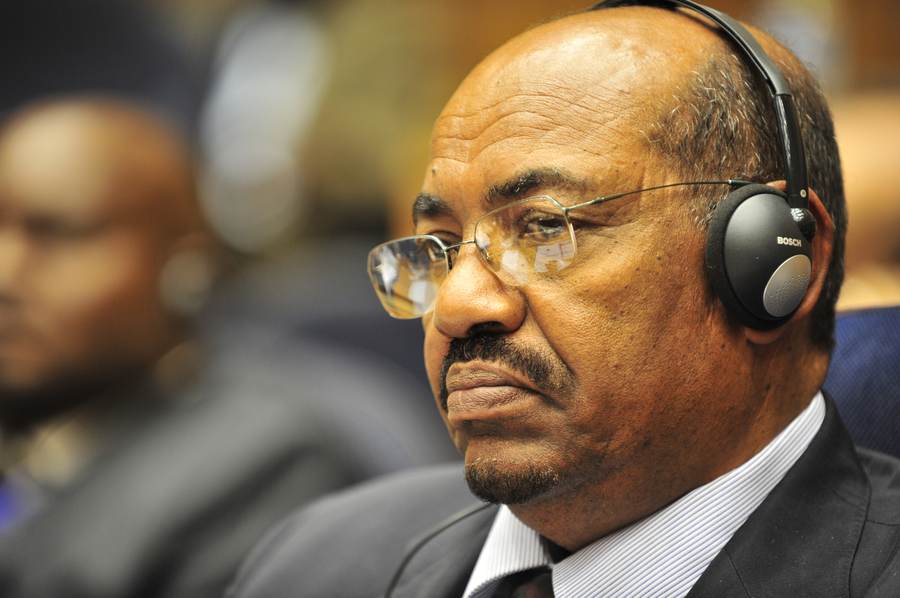 Omar al-Bashir at the 12th African Union summit in 2009 — the year of his first ICC arrest warrant; his Khartoum hospital transfer has revived the case