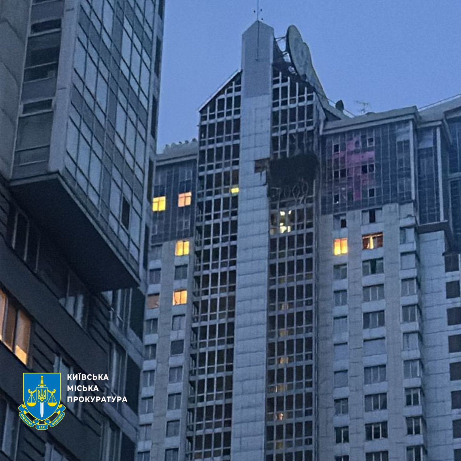 Damaged Kyiv apartment tower shown as context for the Kyiv drone strike that killed a boy in Pechersk