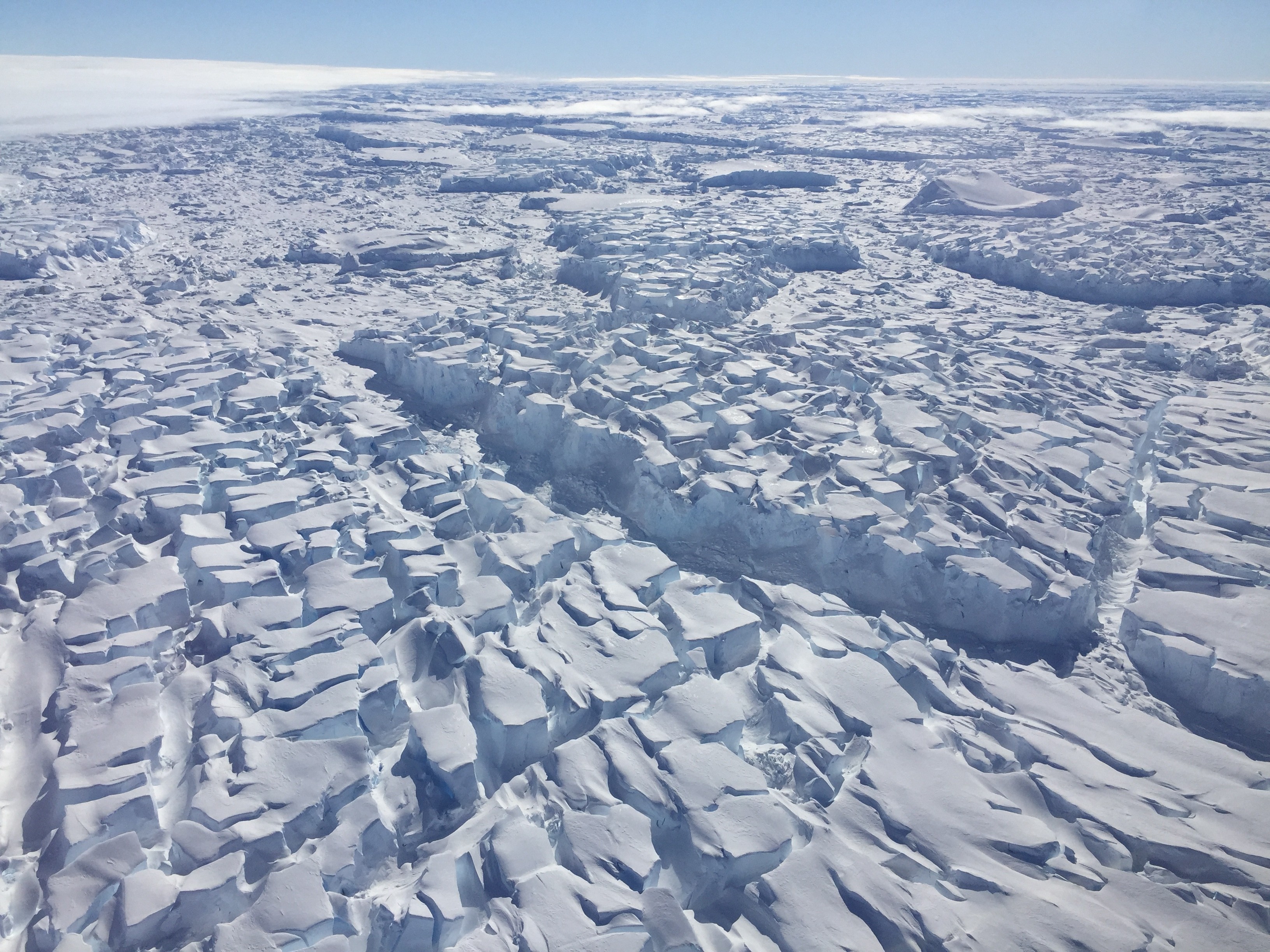 Fractured ice and iceberg mélange at the front of Thwaites Glacier in West Antarctica
