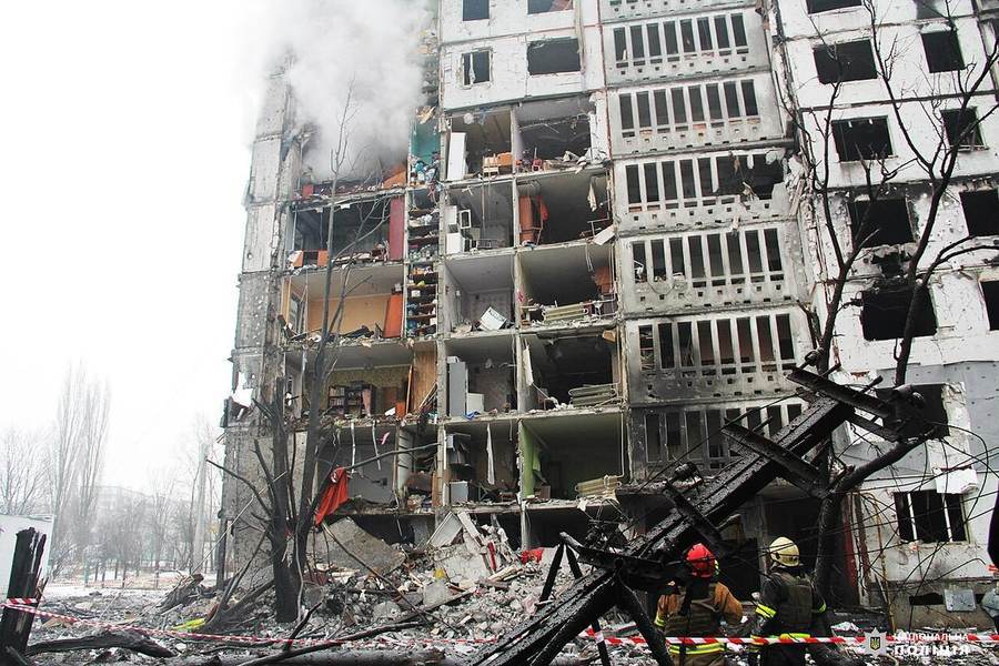 Rescue crews below a heavily damaged Kharkiv apartment block after a January 2024 Russian attack — file image illustrating the September 2026 Kharkiv guided bomb attack