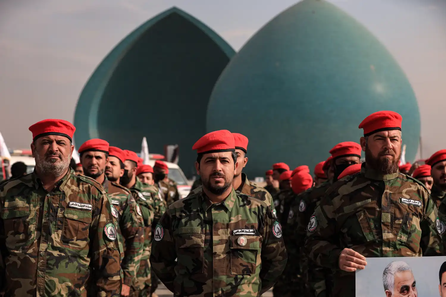 Popular Mobilization Forces fighters in Iraq — Kata'ib Hezbollah operates within the Iran-aligned faction of Iraq's militia landscape