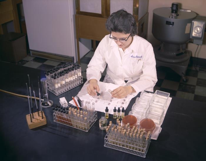 CDC laboratory technician processing specimens for analysis