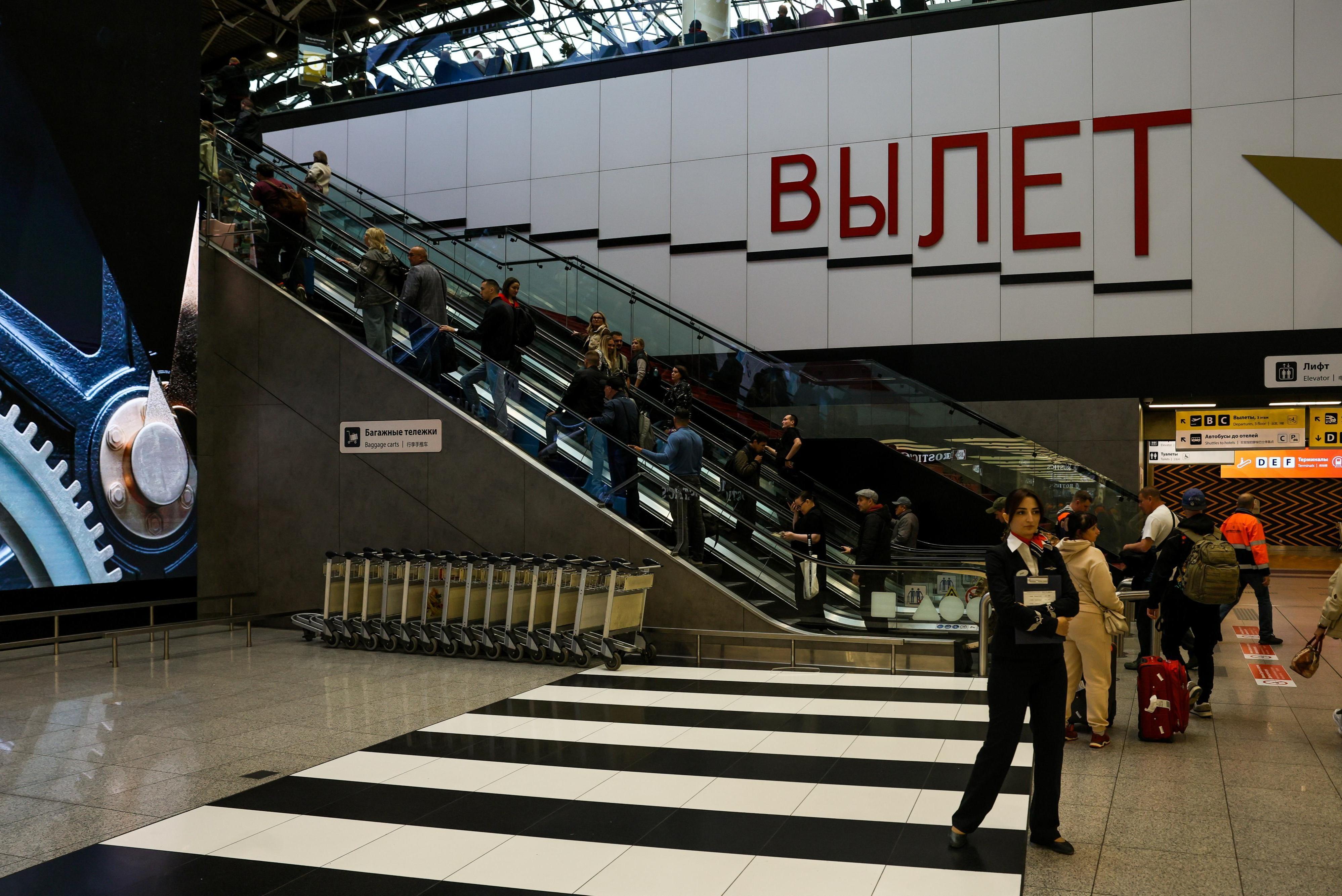 Passengers inside Sheremetyevo airport, one of four Moscow airports closed during the drone assault