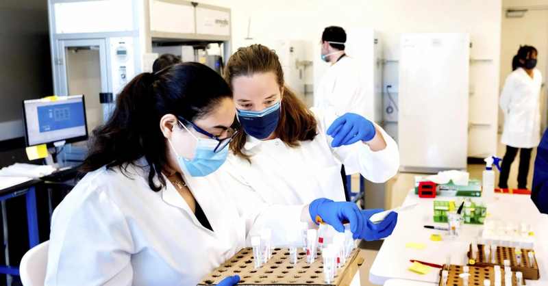 Chan Zuckerberg Biohub scientists processing biological samples in a laboratory