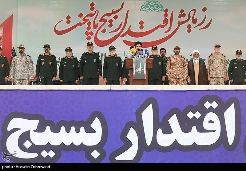 Basij members at a Tehran military exercise before the Iran Janfada campaign expanded training for teenagers