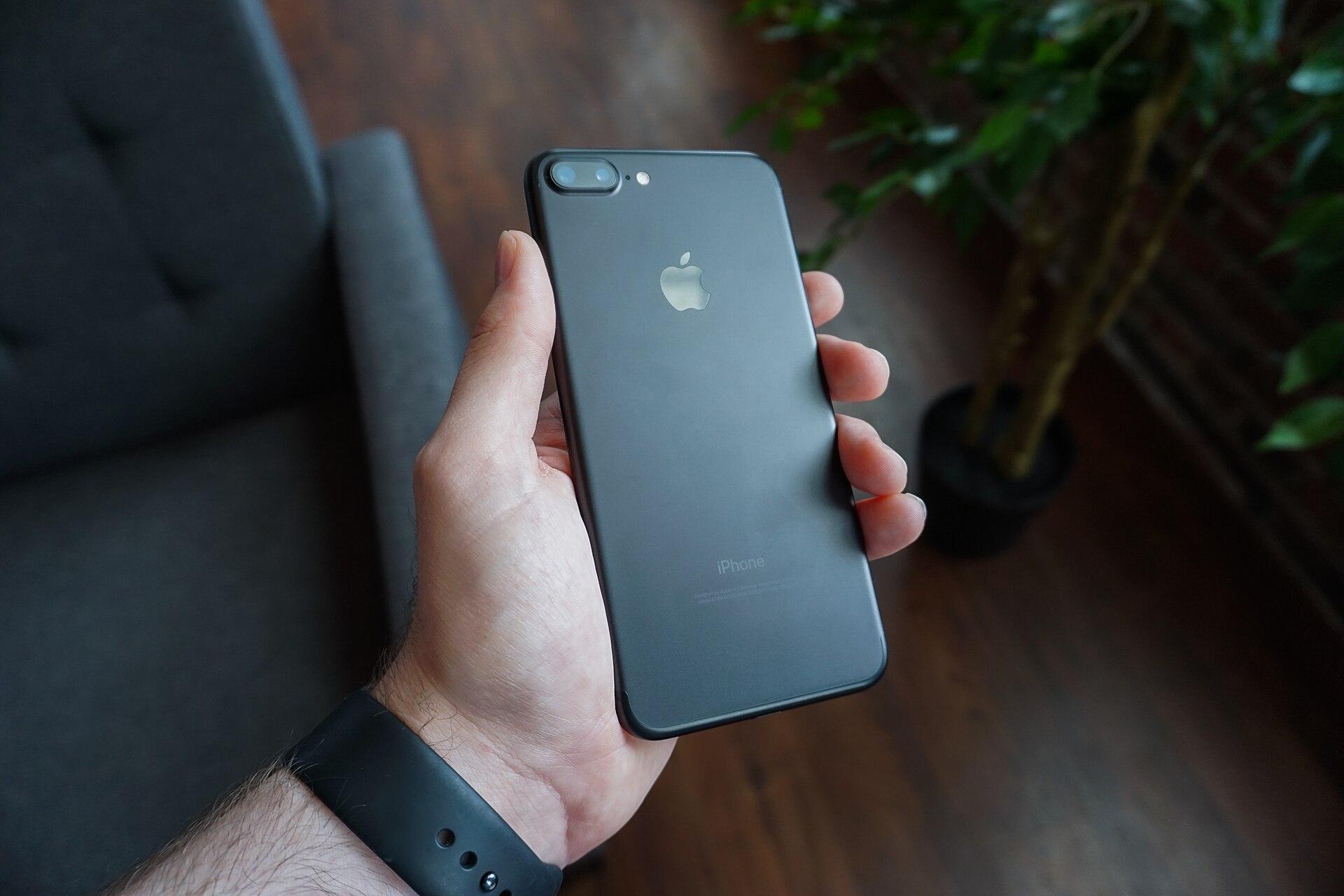 A smartphone in hand — the iPhone Duo is Apple's first foldable phone, starting at $1,999