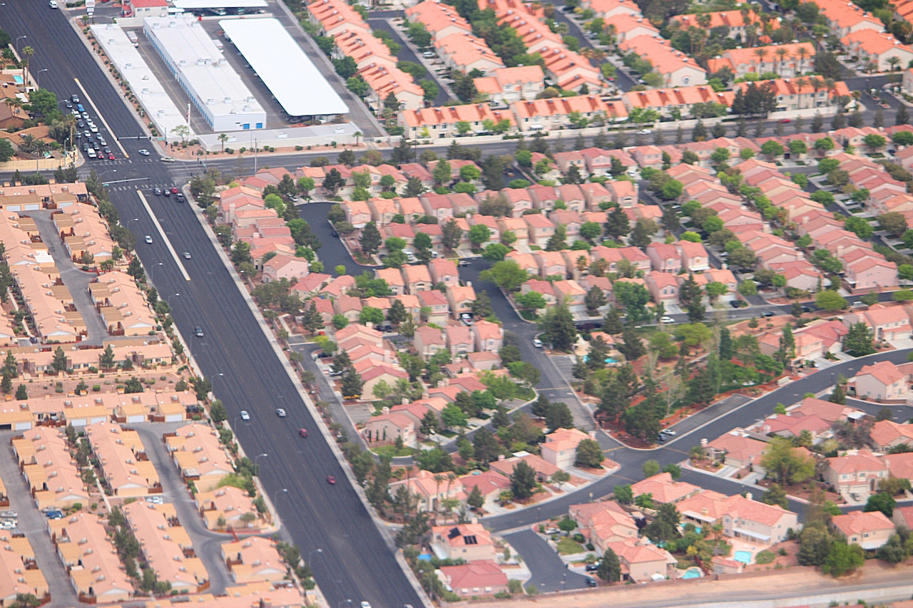 Aerial view of suburban single-family homes in Las Vegas — Trump housing executive order targets mortgage insurance and closing costs
