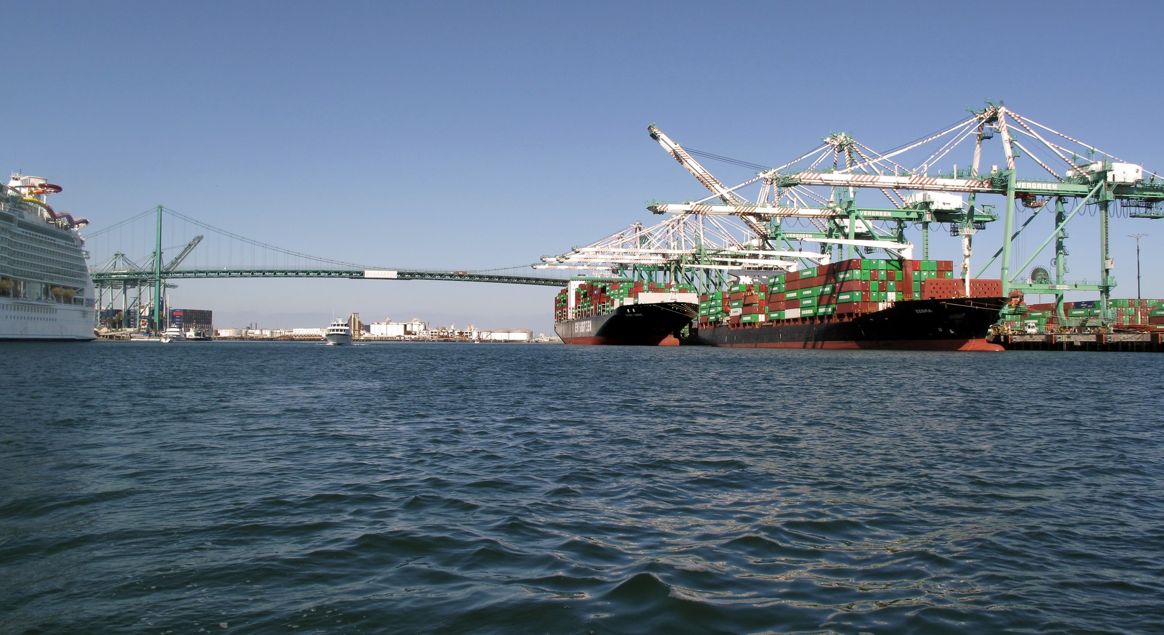 US supply chain bottlenecks October 2026 — container ships at the Port of Los Angeles, as supplier delivery times hit a four-year low in the PMI survey