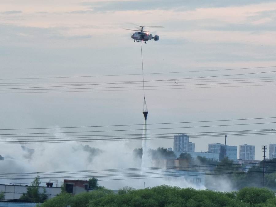 Helicopter fire crews tackle an industrial fire in Moscow in a file photograph, not the Krasnozavodsk plant