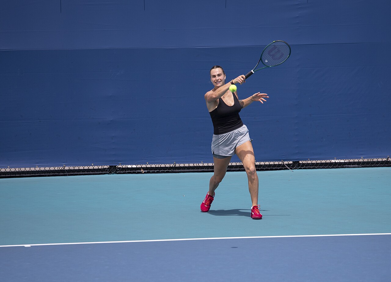 Aryna Sabalenka hitting a forehand, as the Sabalenka Wuhan Open loss to Ann Li ends her title defence