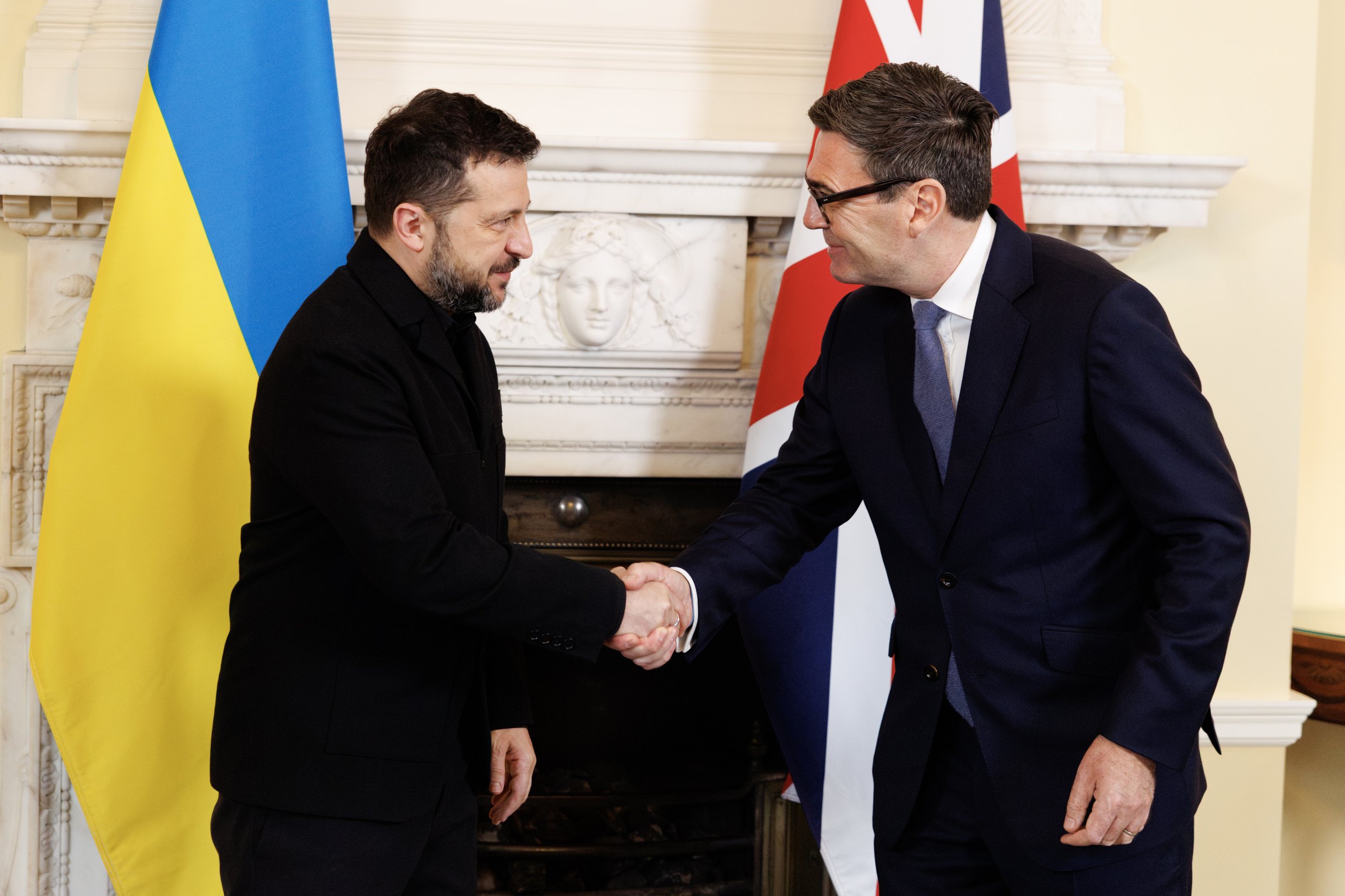Ukrainian President Volodymyr Zelenskyy shakes hands with British Prime Minister Andy Burnham at 10 Downing Street in London on October 15, 2026