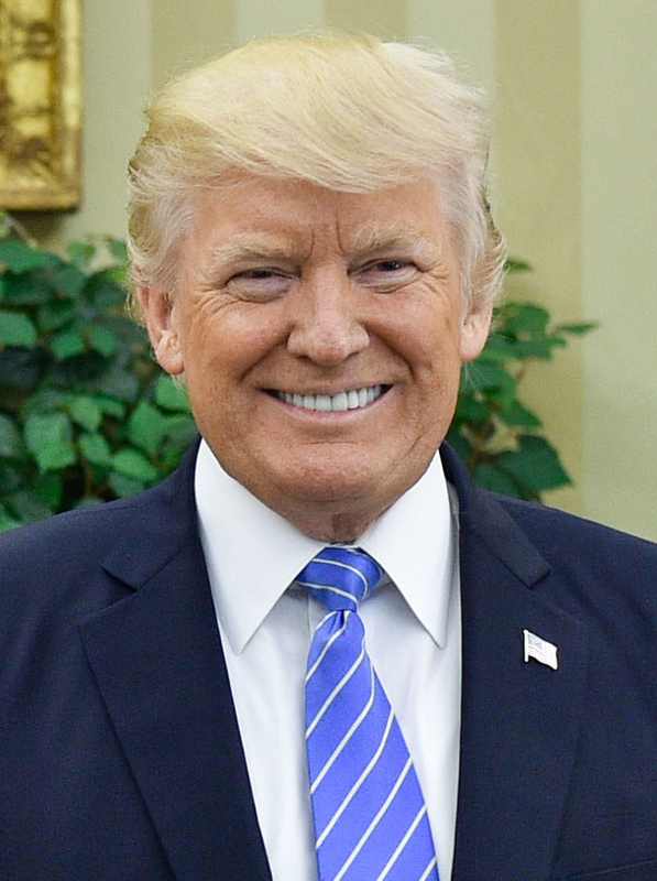 President Donald Trump in the Oval Office — Trump threatened Wednesday to fire campaign advisers Chris LaCivita and James Blair over their consulting work for a pro-Russian party in Bosnia.