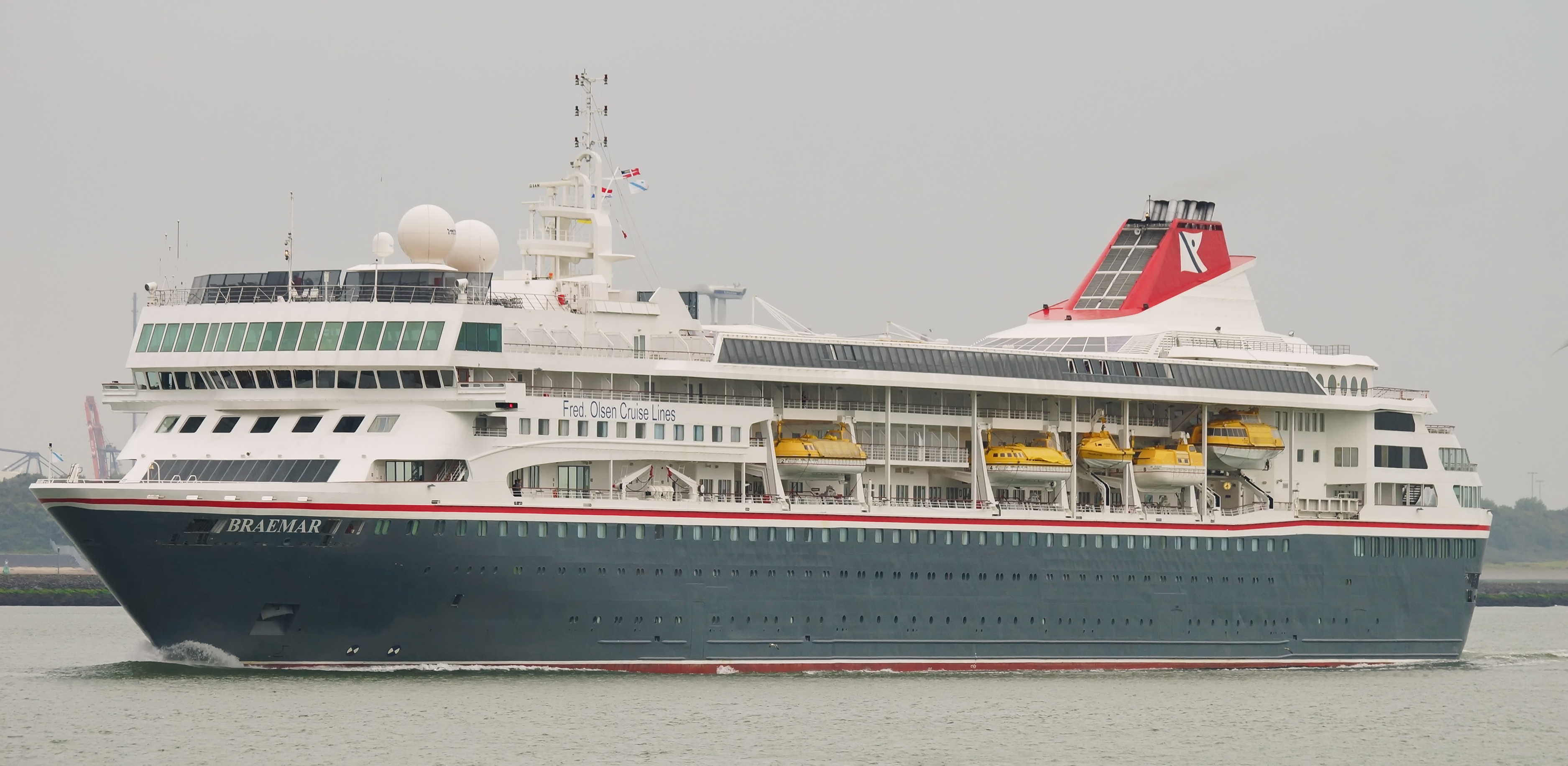 Villa Vie Odyssey residential cruise ship, pictured under her former name Braemar, sailing the Nieuwe Waterweg