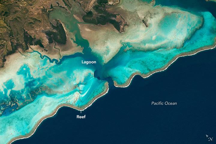 New Caledonia barrier reefs photographed from the International Space Station above the seismically active Australian-Pacific plate boundary