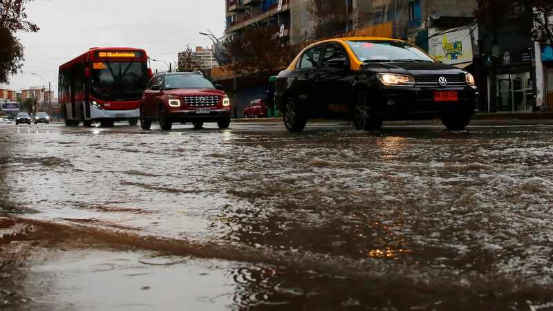 Vehicles crossing floodwater during the Chile Santiago floods