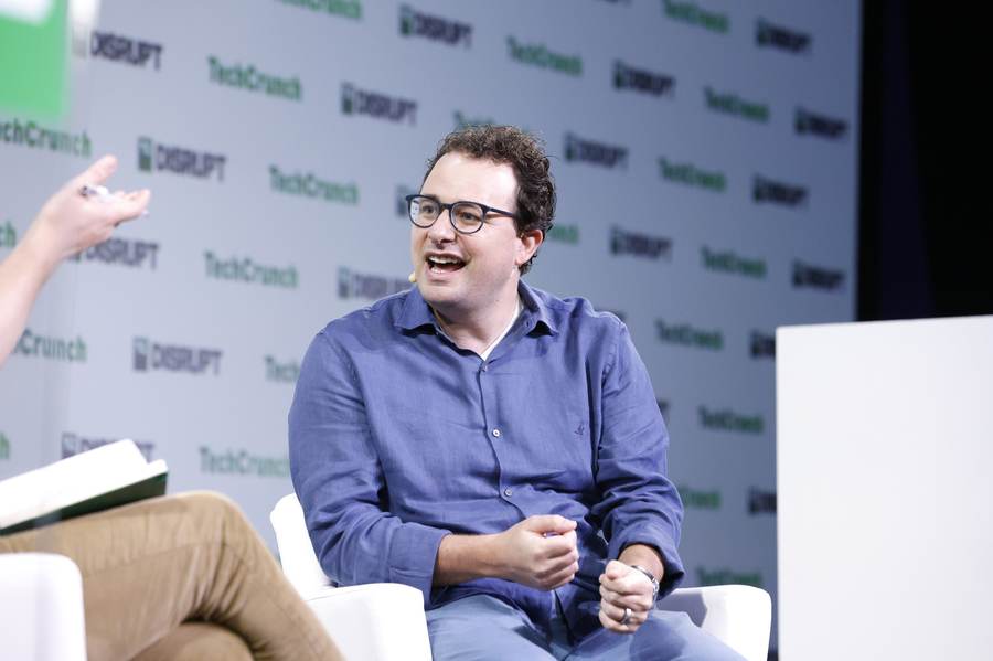 Anthropic CEO Dario Amodei at TechCrunch Disrupt 2023 during debate over OpenAI safety team exits
