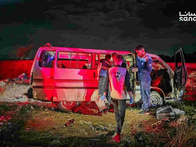 Syrian forensic investigators inspect the bus targeted in the Masyaf bridge attack in Homs, September 30, 2026 (Photo: SANA via AFP)