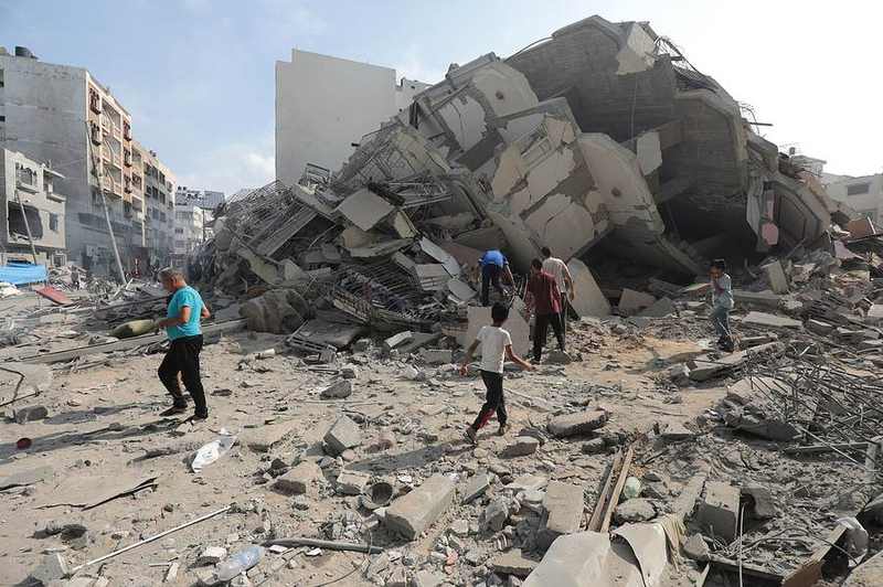 Gaza City buildings damaged by airstrikes, context for the October 2026 Israeli strikes on Islamic Jihad commanders