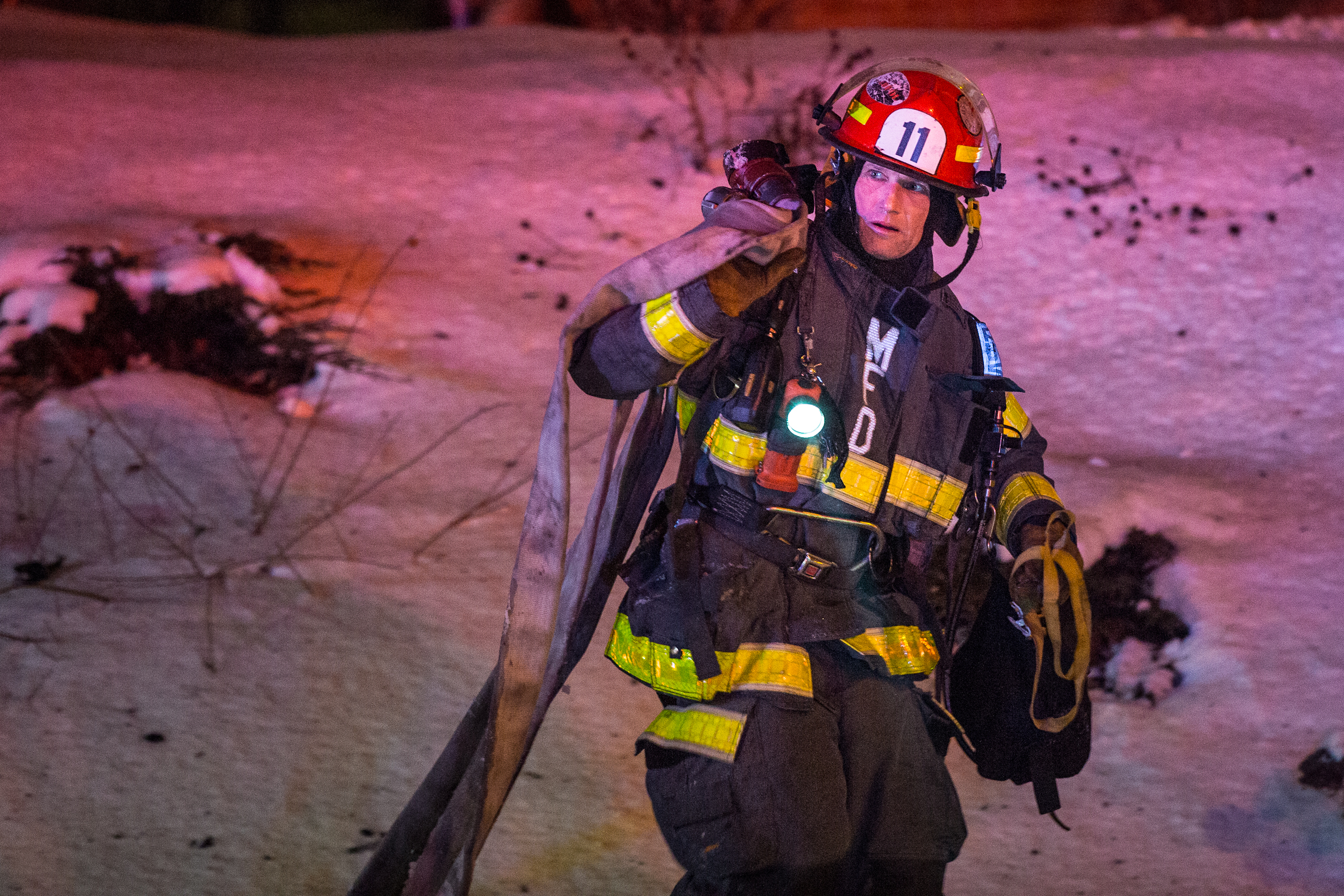 Brookdale Clinton fire — firefighters battling a structure fire at night, of the kind Clinton and Jackson crews faced at the senior living home