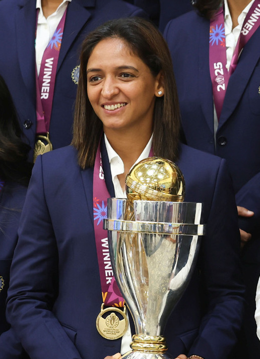 Harmanpreet Kaur with the 2025 Women's Cricket World Cup trophy after India's historic home triumph