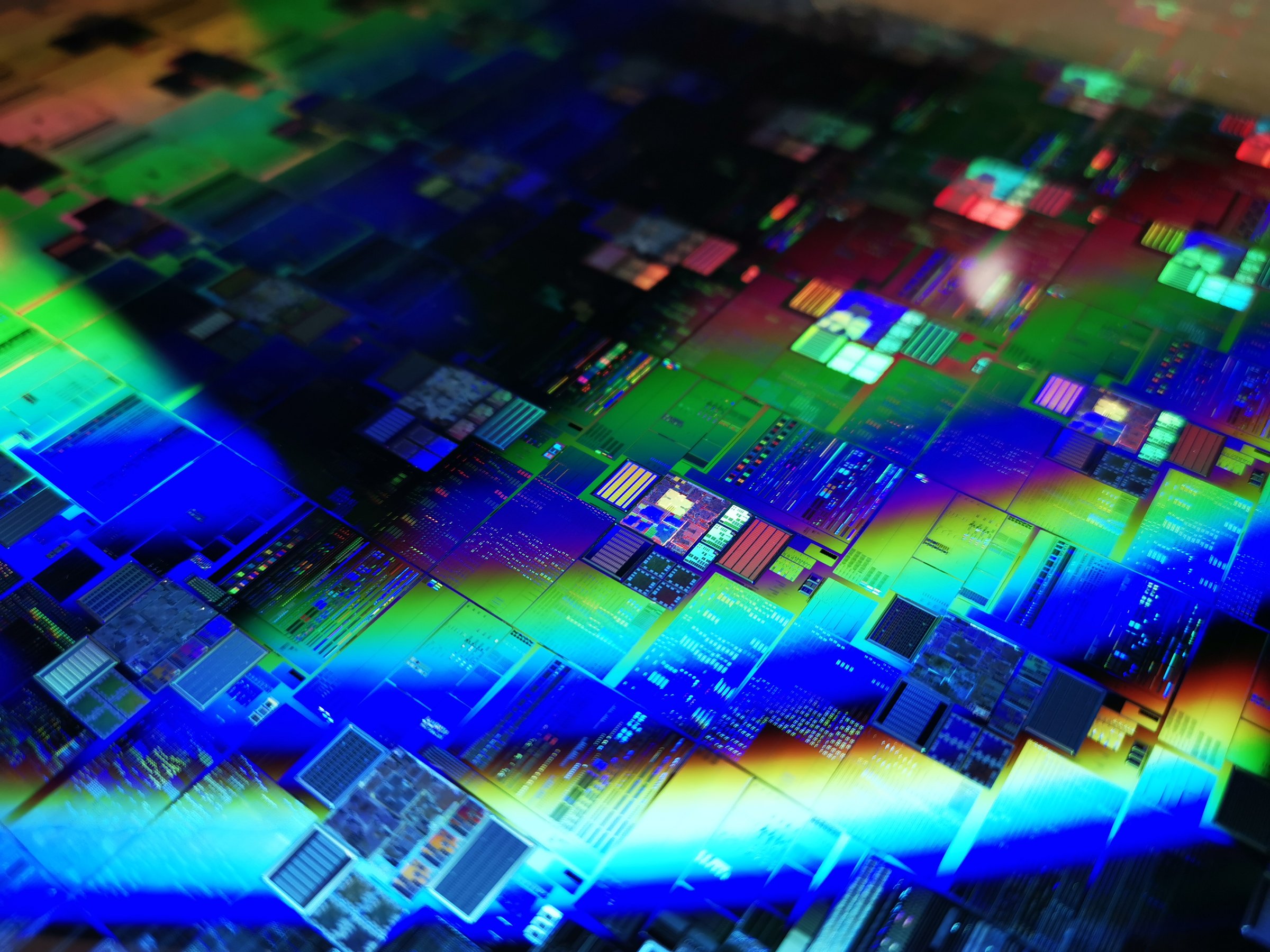 A silicon wafer held up to the light