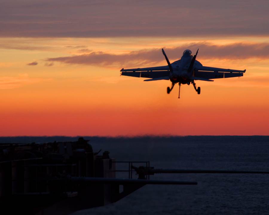 An F/A-18F Super Hornet launches from USS Theodore Roosevelt, whose strike group is sailing to the Middle East