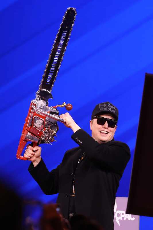 Elon Musk speaking at an event — Musk has accused unnamed oligarchs of blocking the Starlink India launch
