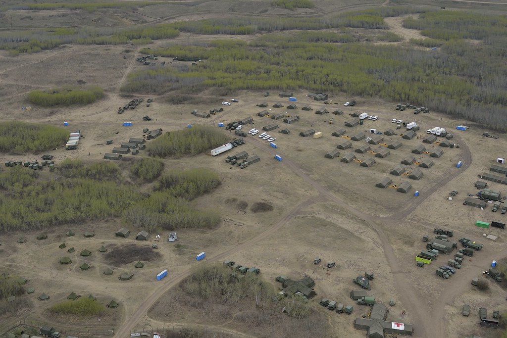 Aerial view of a Canadian Army field camp and training area at CFB Wainwright in Alberta — CFB Wainwright fire