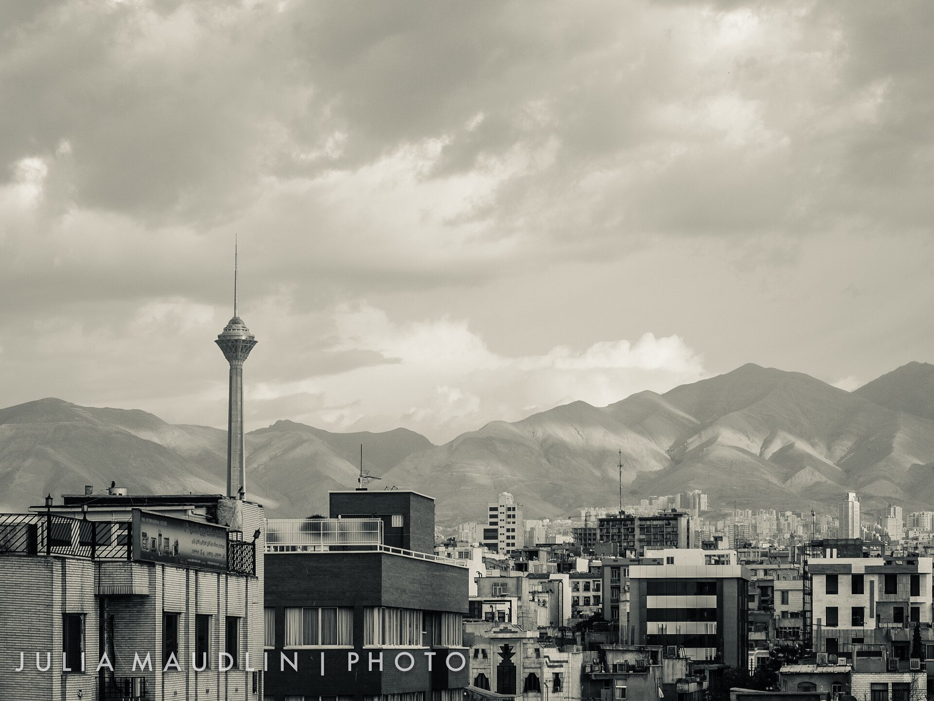 Tehran skyline with the Milad Tower and the Alborz mountains, where the Mecca Pact Tehran meeting with Iranian officials is set to take place