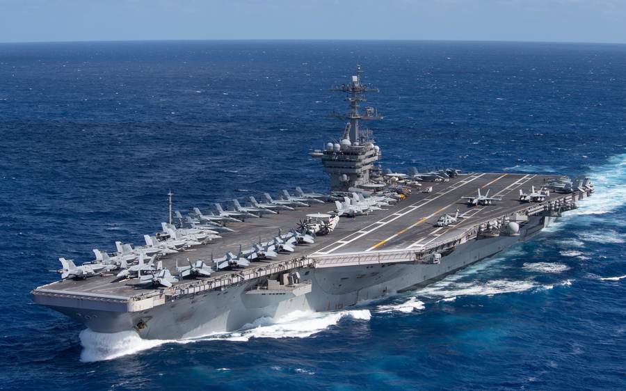 The aircraft carrier USS Theodore Roosevelt underway. The Roosevelt carrier strike group sailed from San Diego with more than 7,000 sailors toward the Middle East.