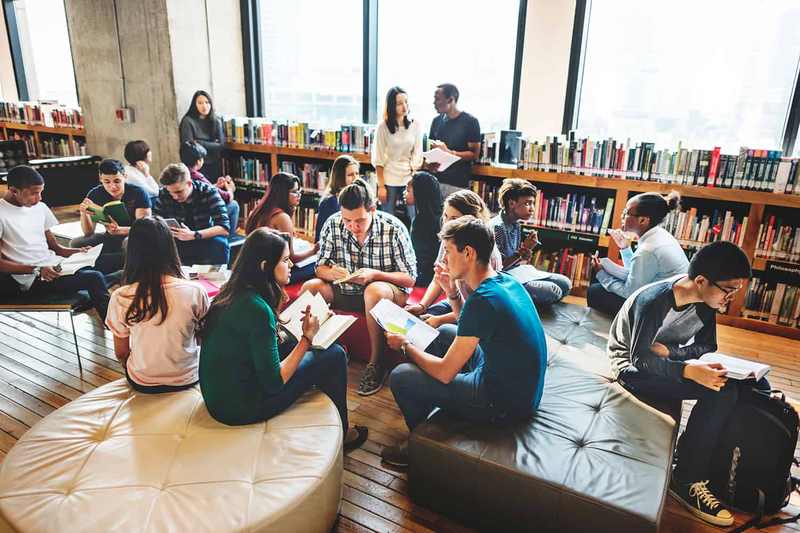 A high school library — PEN America says nearly 12,000 books were banned in public schools in 2025-26