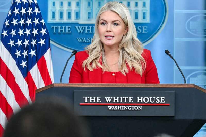 Karoline Leavitt at the White House briefing room podium before leaving in August 2026