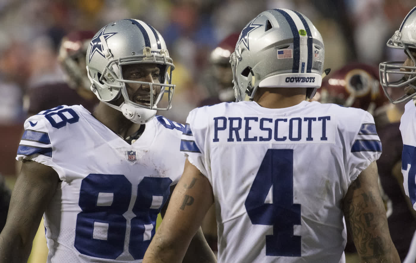 Dez Bryant, wearing number 88, talking with quarterback Dak Prescott during a Cowboys game in 2017 — file photograph
