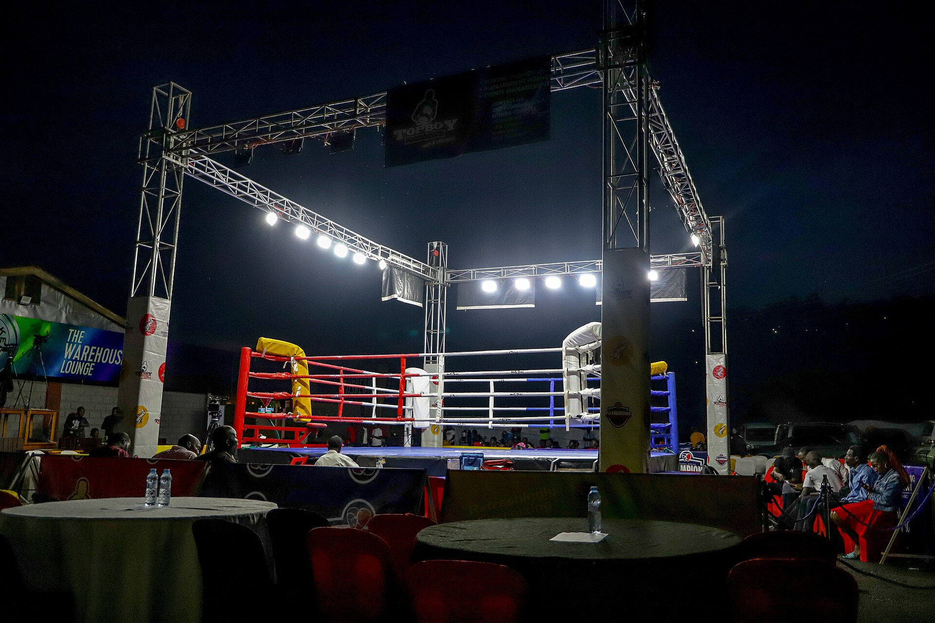 Idi Amin grandson disqualified — a Uganda Boxing Federation ring set up under floodlights, the federation whose colours Aziz Abdul represents