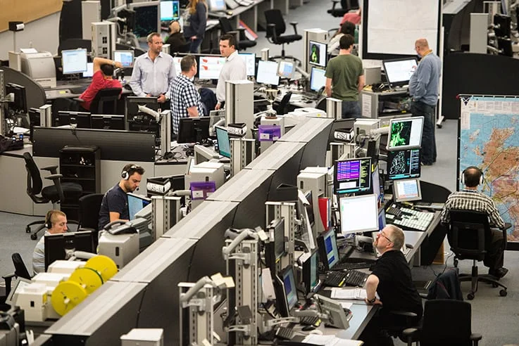 Air traffic controllers working in the NATS Prestwick operations room
