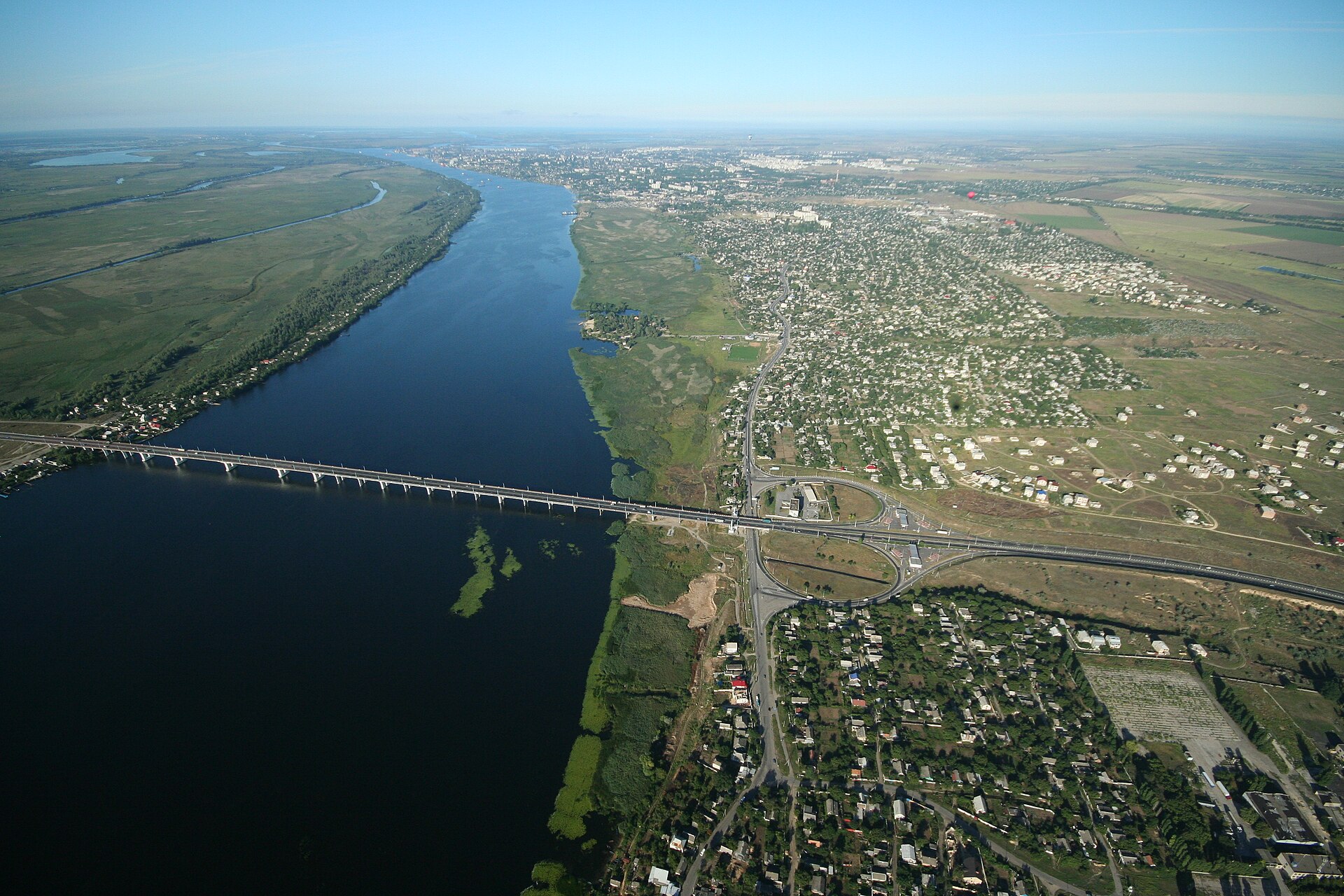 The Antonivka Road Bridge over the Dnipro near Kherson, in a file photo — the destroyed crossing is why Oleshky evacuees must travel through Russia and Belarus