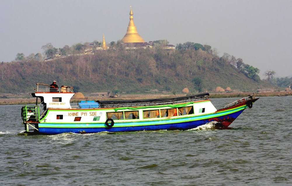 A boat-bus on the Kaladan river in Myanmar — Kyauktaw is a riverside town on the Kaladan in northern Rakhine state, where a junta airstrike reportedly killed at least 33 civilians at the India Market on September 28, 2026