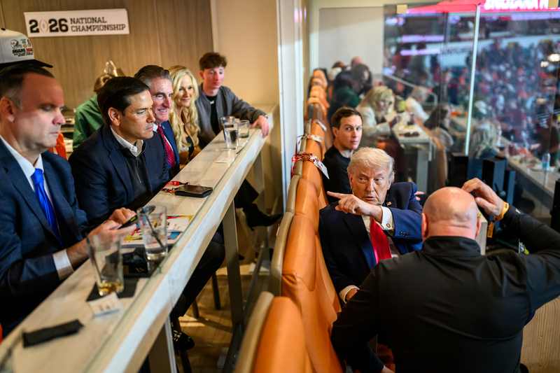 President Donald Trump attends a college football game; he plans to attend Saturday's Alabama-Georgia game in Tuscaloosa