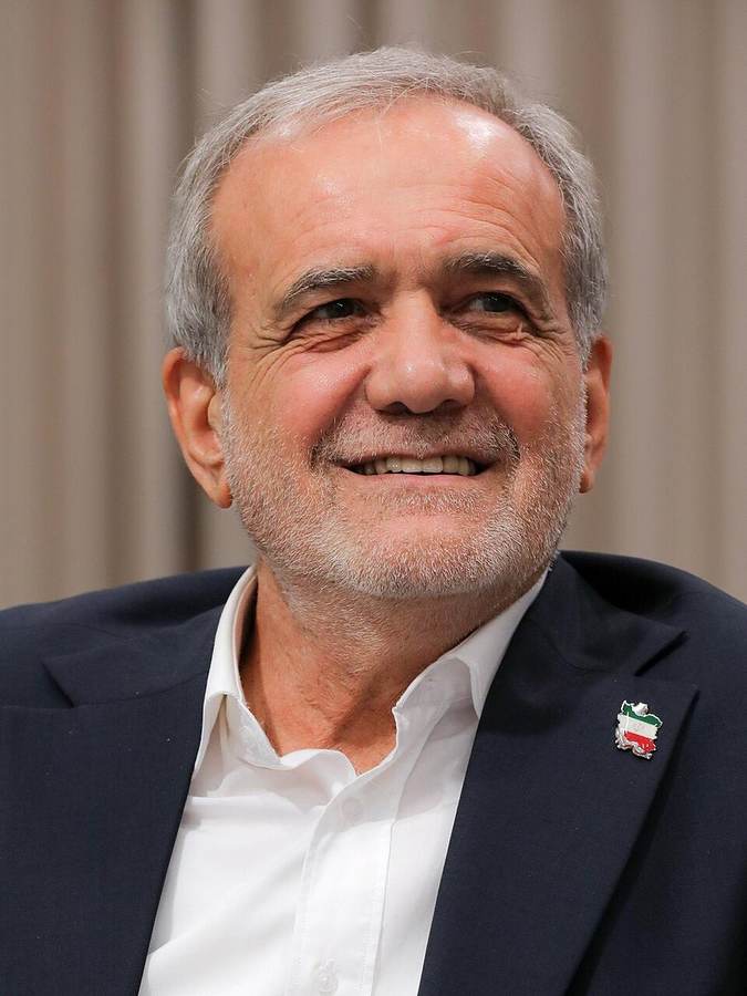 Iranian President Masoud Pezeshkian speaking at a podium in a 2025 file photograph