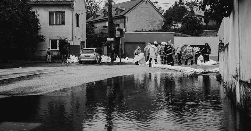 Residents stocking sandbags and emergency supplies under Florida's state of emergency hurricane declaration ahead of Tropical Storm Isaias landfall.