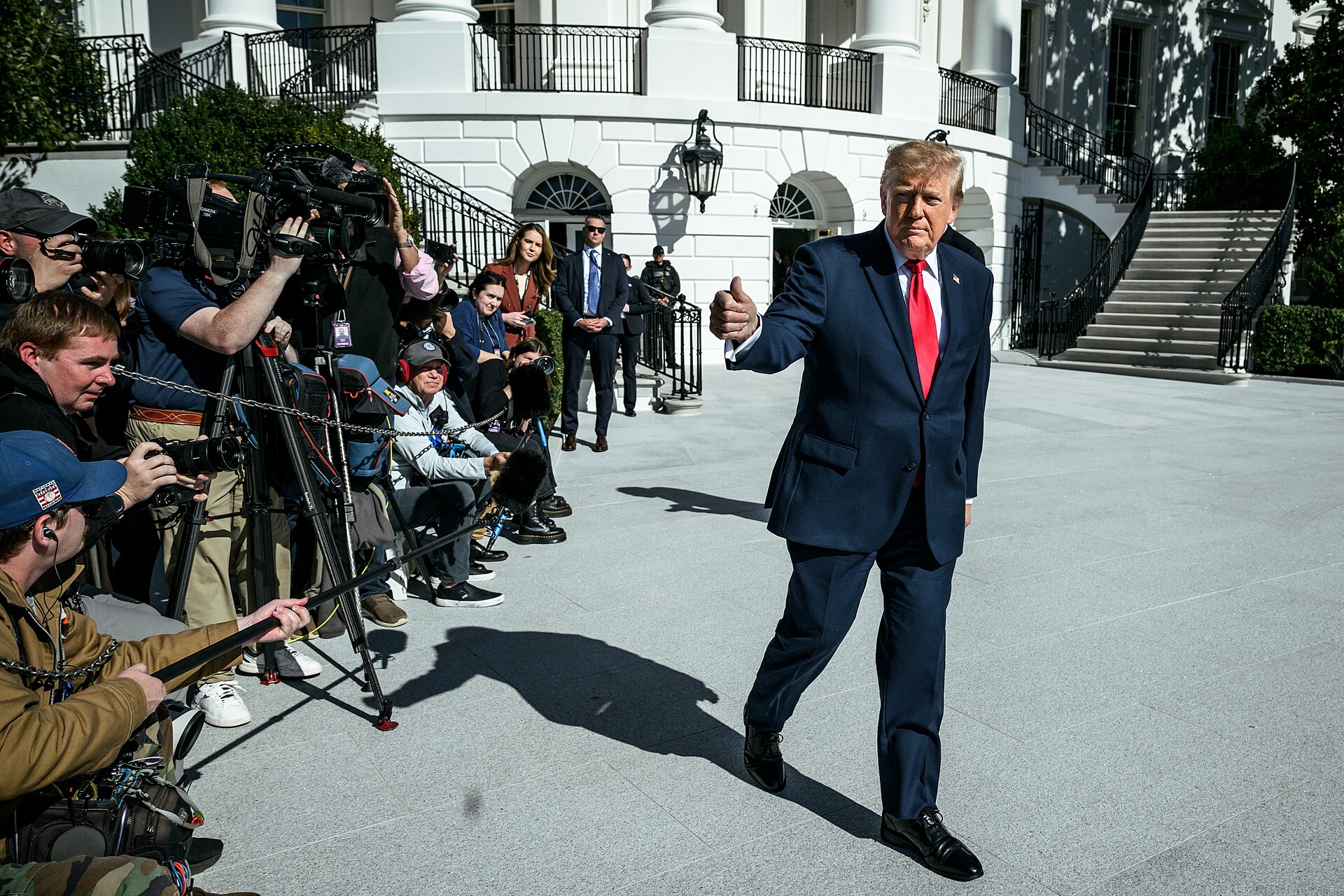 President Donald Trump gives a thumbs-up to reporters on the South Lawn of the White House on October 25, 2026, the day before his Corinth Mississippi rally