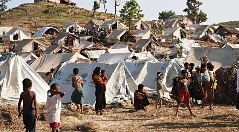 Rohingya families displaced from Rakhine State living in a crowded refugee camp