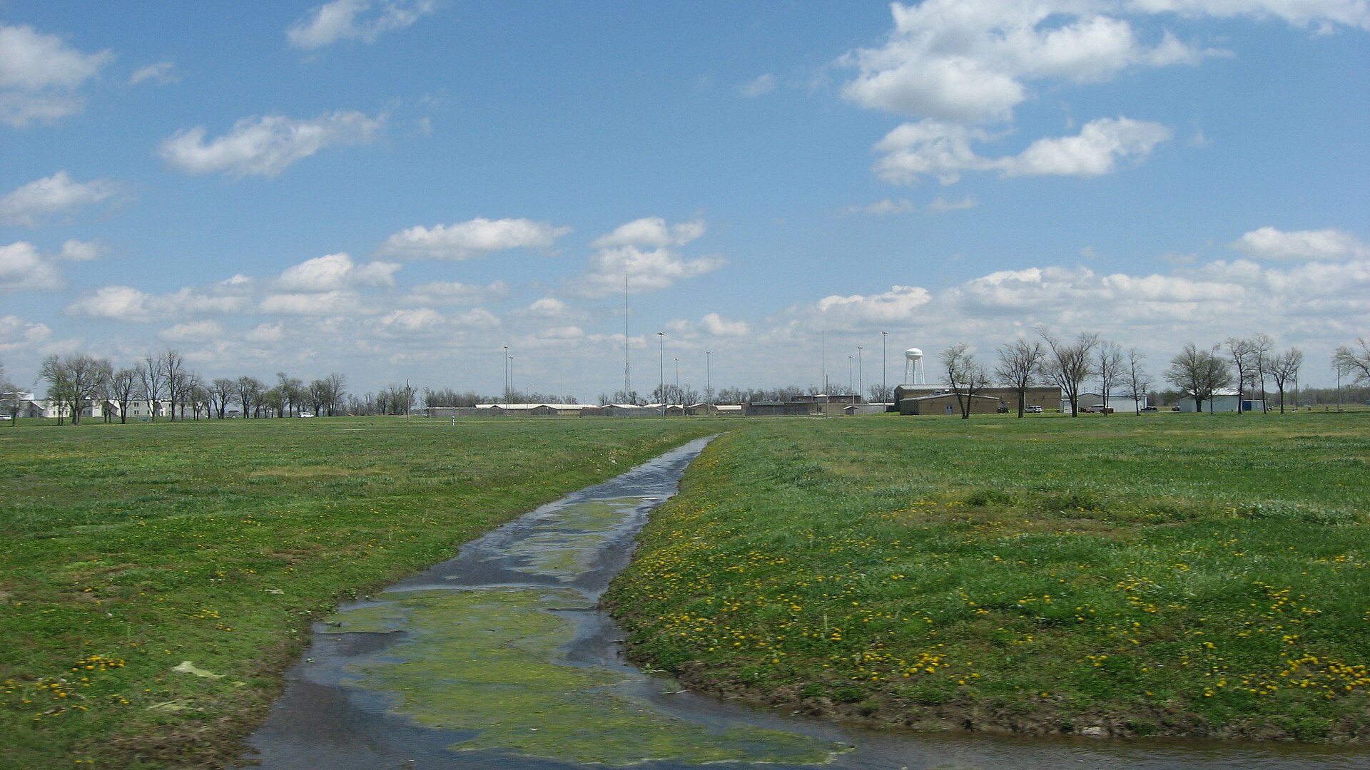 Tennessee manhunt escaped inmate — the Northwest Correctional Complex in Tiptonville, Tennessee, seen from the west across flat farmland