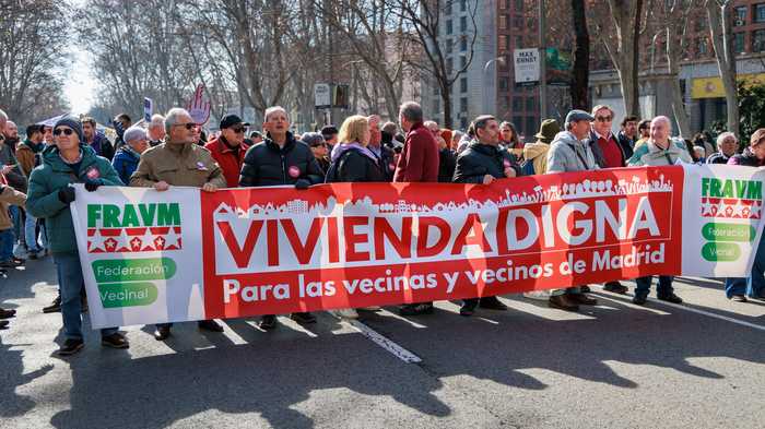 Marchers fill a Madrid street during the Spain housing crisis protest — Spain housing crisis protest