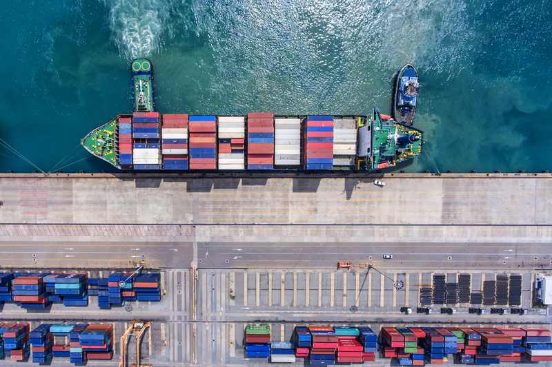Aerial view of a container ship carrying EU–China trade cargo — EU China trade talks October 2026