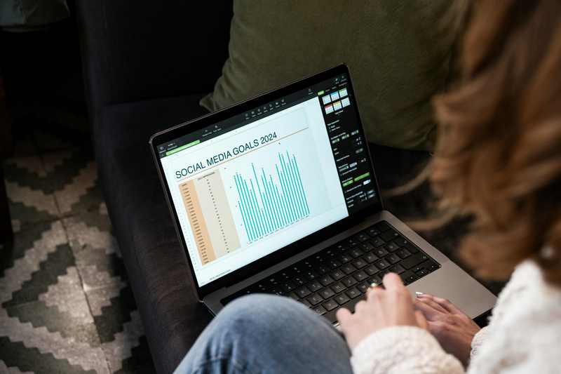 Creator reviewing social-media analytics on a laptop after Instagram Reels views dropped overnight
