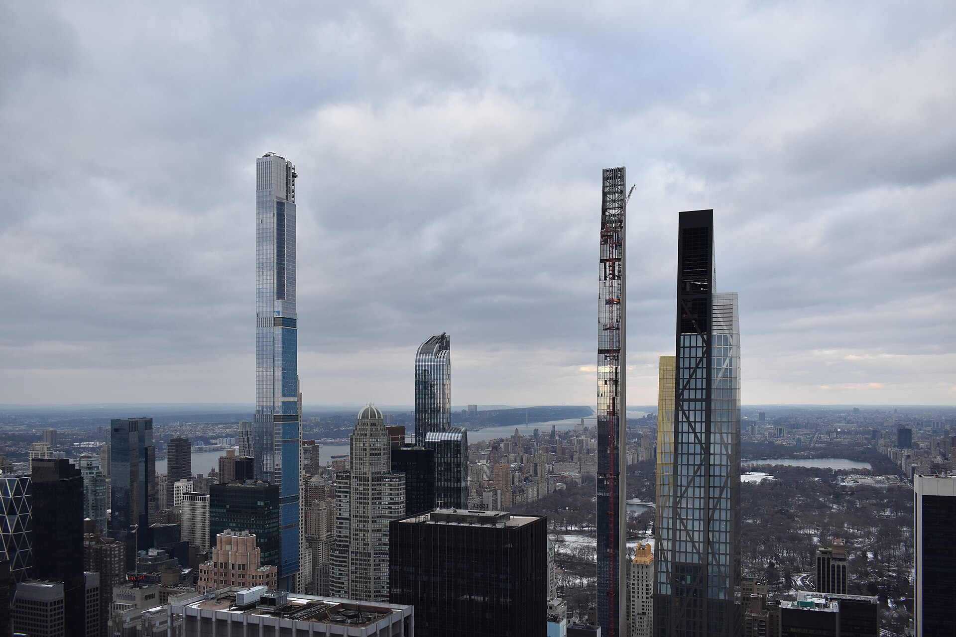 The supertall luxury residential towers of Billionaires Row in Manhattan, the world of high-end real estate where Oren and Tal Alexander built their careers